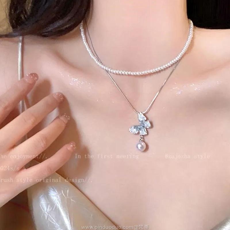 Niche Super Immortal Gravel Butterfly Tassel Necklace Women's Light Luxury Temperament Simple Fairy Neck Chain New Clavicle Chain Explosion