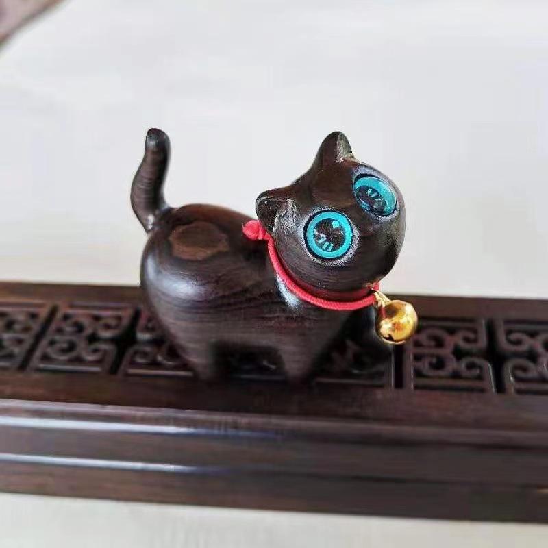 Adorable Green and Black Sandalwood Cat Ornament - Cute, Curious Desktop Miniature, Perfect Creative Gift for Kids.