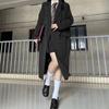 Длинный черный женский тренч — в изысканном корейском стиле, коллекция весна/осень 2025.