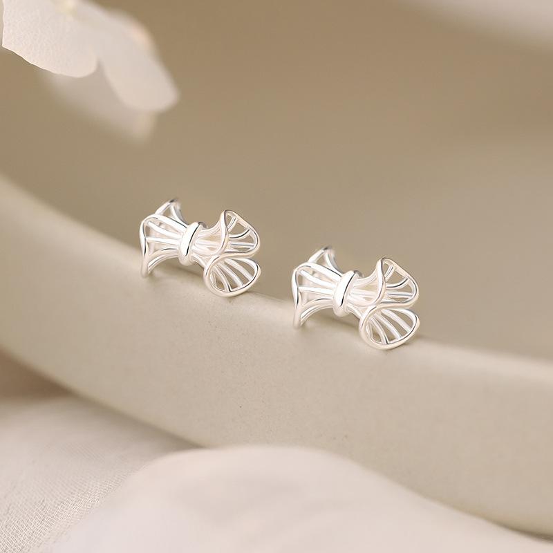 Hollow Bow Ribbon Earrings Sweet and Cute Niche High-end Ear Piercing Ear Decoration
