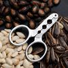Watermelon Seed & Nut Opener: Special Clip for Shelling Pine Nuts and Hazelnuts