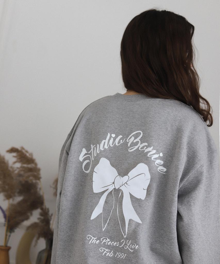 BONIEE [Fleece Lined] Back Ribbon Graphic Oversized Sweatshirt Gray