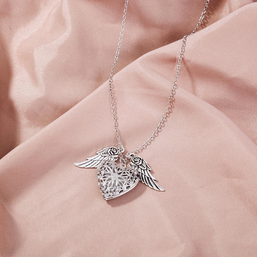 Woman Jewelry Flying Heart Glow Locket with Rose Wings Magic Glow In The Dark Jewelry Necklace