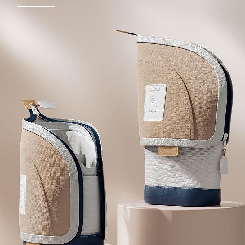 Вместительный выдвижной пенал-подставка для учеников начальной школы