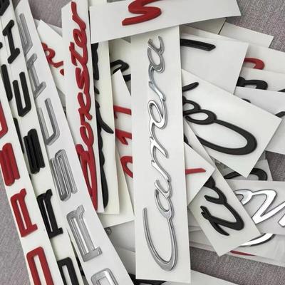 Новый оригинальный логотип с глянцевым покрытием черного, красного и серебристого цветов.