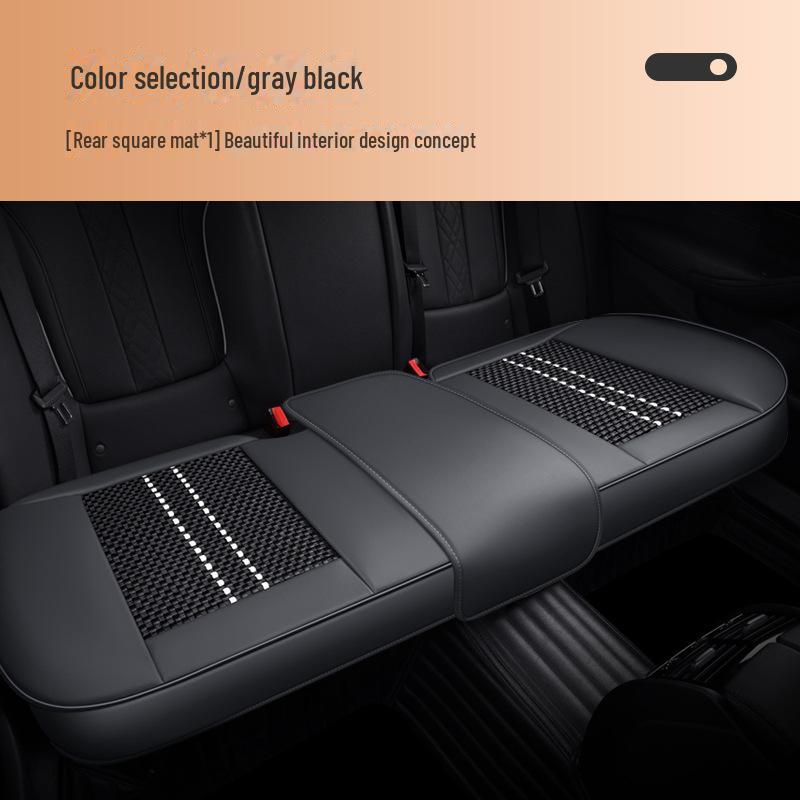 Комплект всесезонных подушек на сиденье автомобиля для водителя, с кожаной обивкой и материалом Ice Silk для вентиляции и противоскользящими свойствами.