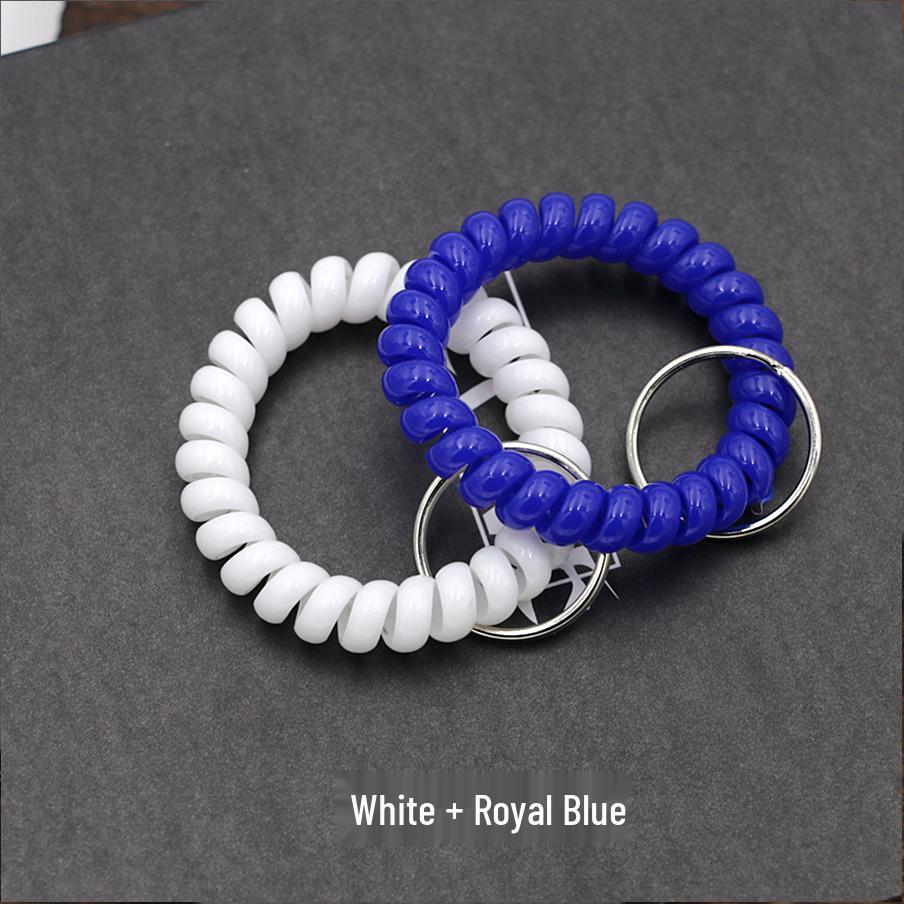 Минималистичный браслет-брелок и резинка для волос в виде пружинного механизма