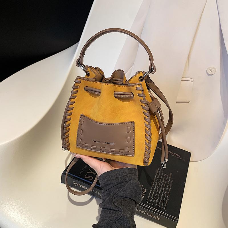 Высококлассная нишевая сумка женская осень-зима 2025 новая ретро-модная сумка-мессенджер плетеная портативная мини-сумка-ведро