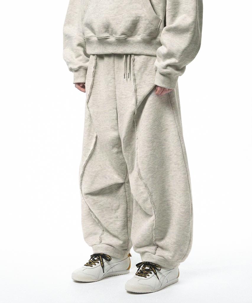 PRINOAR Refined Oblique Curved Sweatpants - Oatmeal