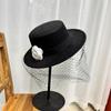 French Hepburn style flat top top hat women's black mesh camellia elegant retro performance photo hat flat edge gift