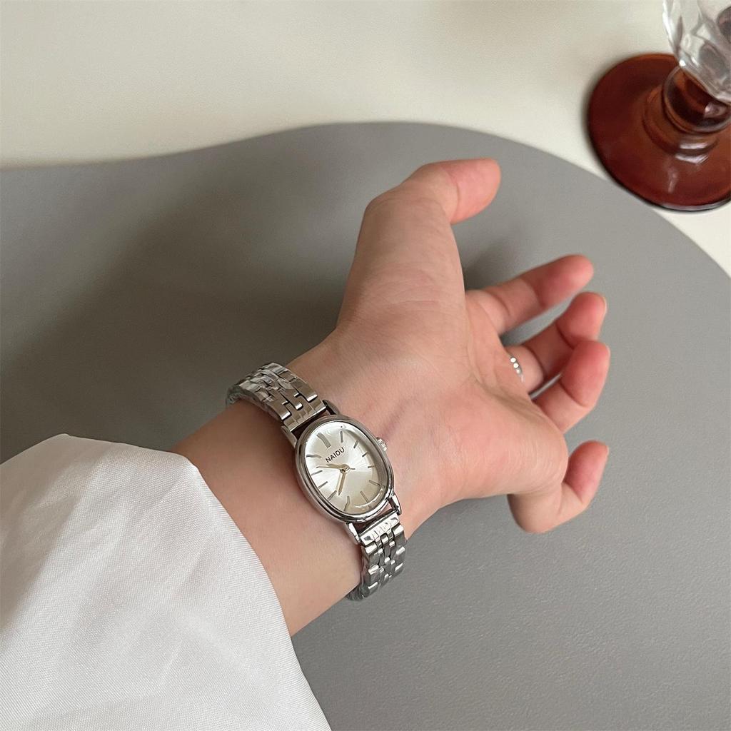 NAIDU Женские повседневные часы класса люкс с овальным циферблатом и стрелочными метками - Стиль знаменитостей, Лидер продаж.