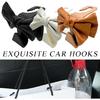 2 PCS Car Seat Headrest Hooks, Cute Bow Shaped Vehicle Backseat Storage Hooks, Leather Bow Shaped Sturdy Car Seat Back Hooks For
