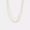 Нежное многослойное цепочное ожерелье золотого цвета