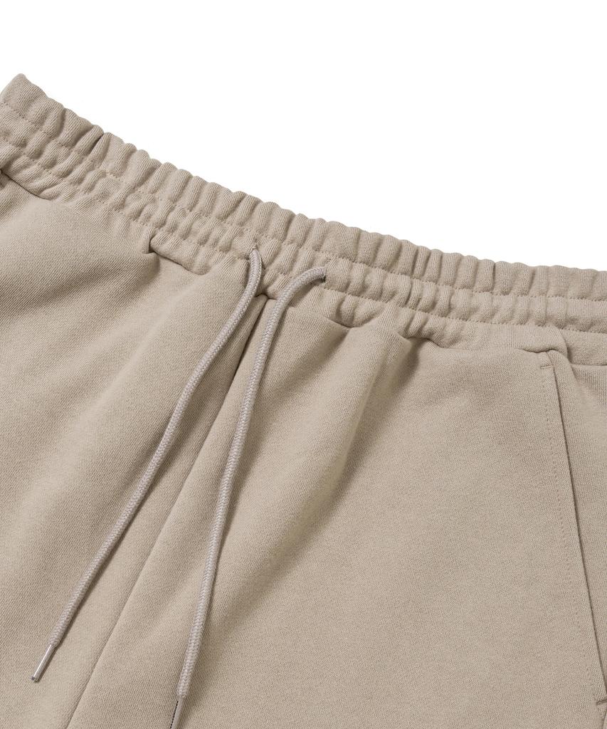 BROWNBREATH Tag Sweat Pants - Beige