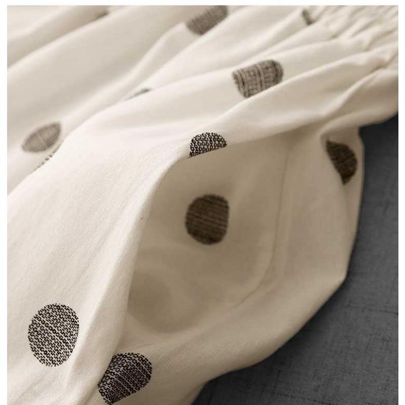 2025 Летняя черно-белая обтягивающая талия в горошек Повседневная универсальная литературная винтажная полуюбка