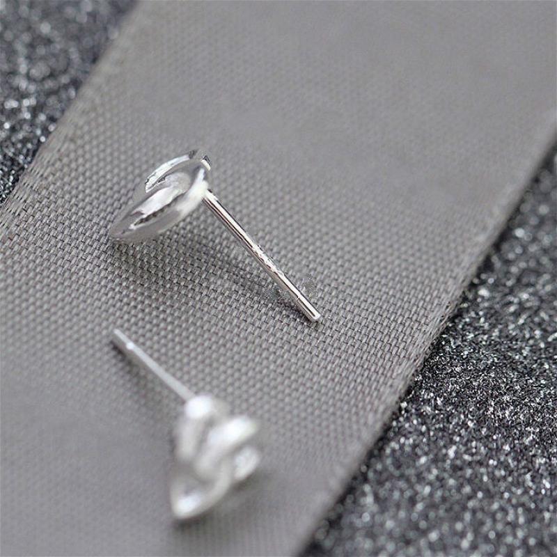 Медные женские серьги в виде переплетённых сердечек