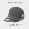 The new simple and versatile baseball cap for men and women couples has a large head circumference, a wide brim, a soft top, and a small peaked cap.