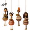 Vintage Dancing Girl Hanging Pendant Hand‑Painted Folk Style Ornament Ethnic Doll with Bell & Basket Rustic Art Resin Ornament Boho Wall