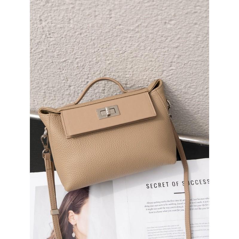 All-matching Retro Design Top-layer Cowhide 2026 Lock-up Fashionable Casual Commuting Portable One-shoulder Cross-body Bag