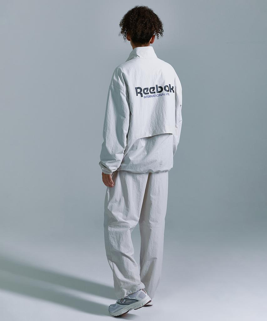 Reebok Теплые штаны Essentials - Бежевые