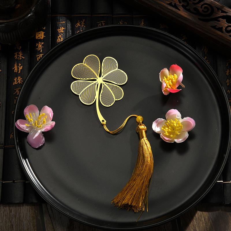 Изысканные полые металлические закладки для книг в форме листа золотого цвета с прожилками лотоса, закладки для книг с кисточками, канцелярские принадлежности для чтения для студентов