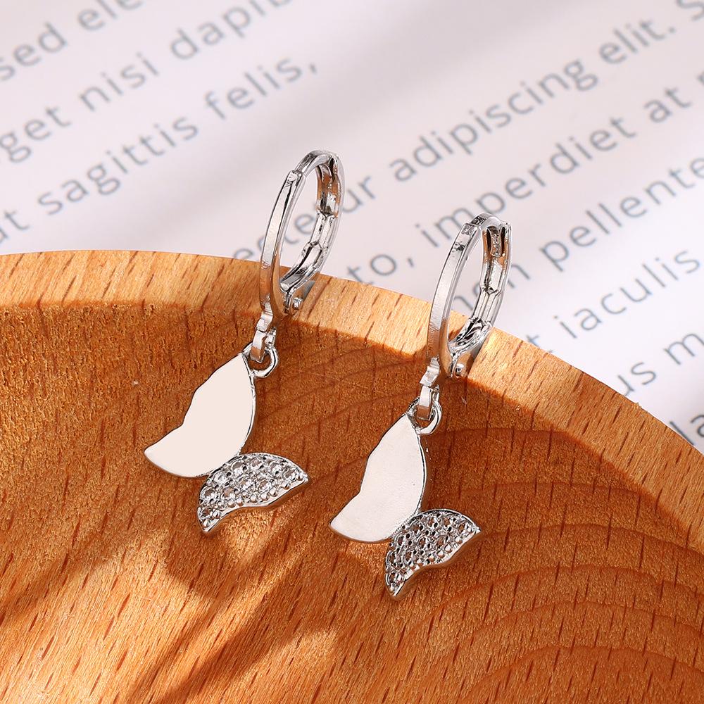 Элегантные клипсы-серьги с цирконом в виде бабочки: Блестящий, Модный, Универсальный дизайн для стильных женщин и студенток