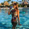 Ins European and American style deep V beautiful back sexy one-piece swimsuit women floral thin black lotus leaf edge vacation swimsuit beach
