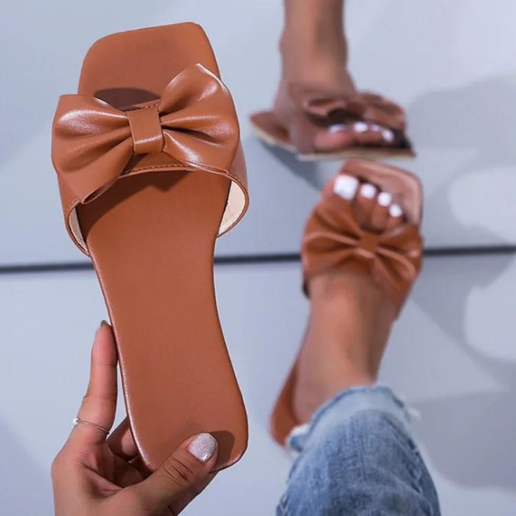 2024 Женские летние новые тапочки с бантом, модные плоские сандалии большого размера ярких цветов, женские сексуальные повседневные пляжные туфли для отдыха на открытом воздухе