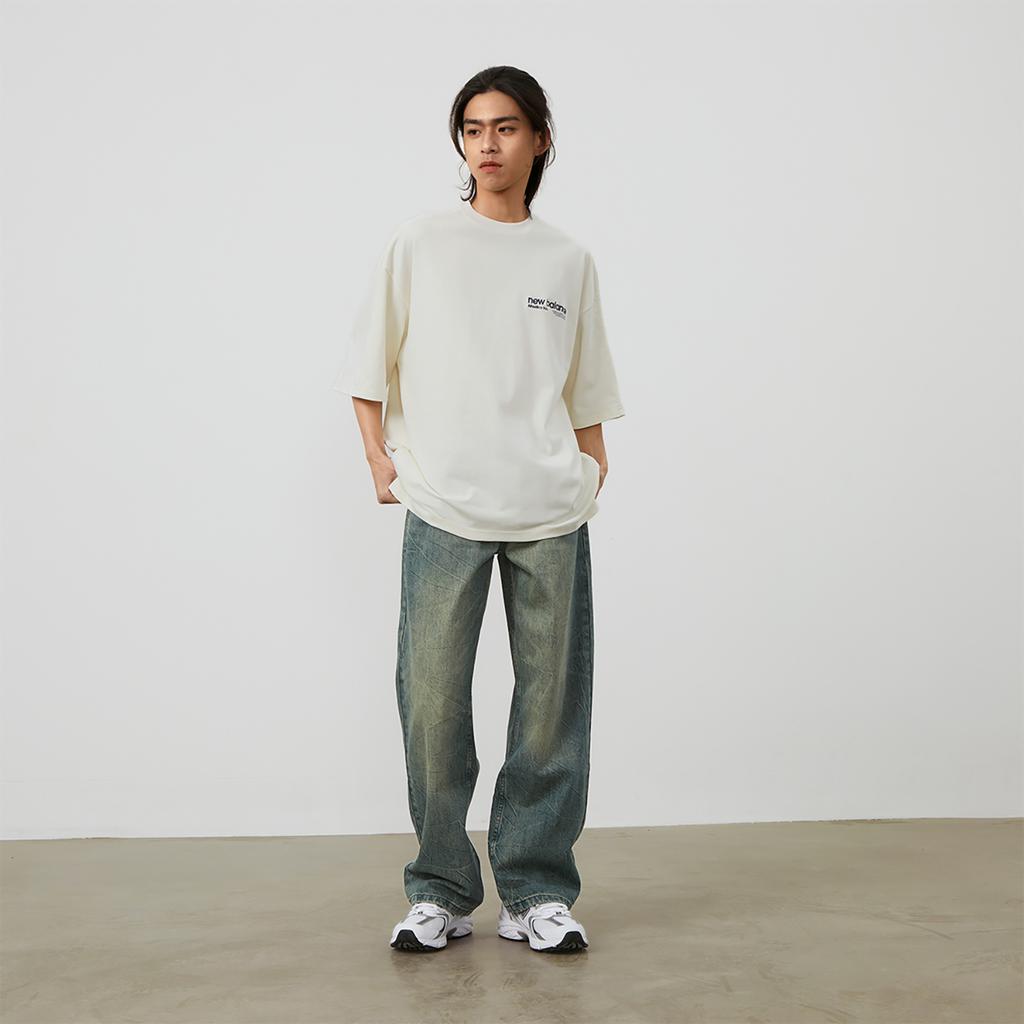 New Balance Футболка унисекс кремово-белая AMT42301-CIC