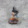 9cm Dragon Ball Kawaii Figurine Childhood Son Goku Hold Puaru Action Figures Anime Model Doll Collection Desktop Decoration Toy