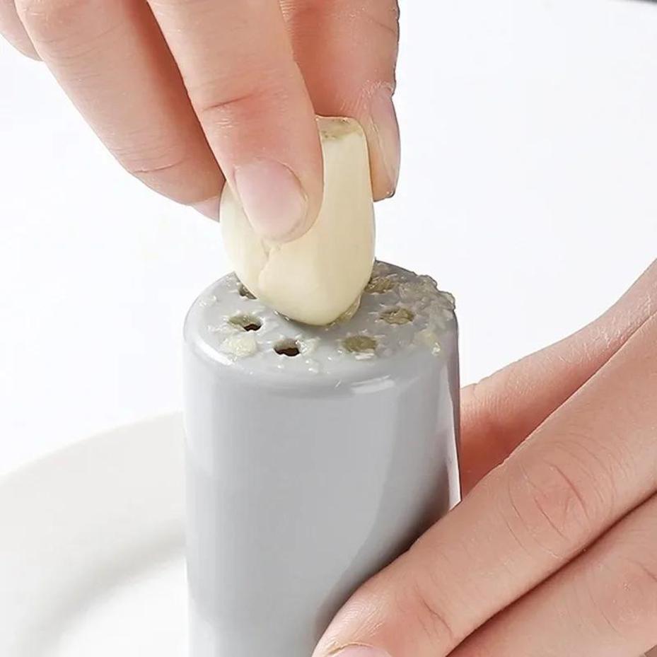 Multi-functional with Cover Three-in-one Peeling Knife Home Fruit Potato Scraper Ginger Garlic Grinder Melon Peel Shaving Wire.