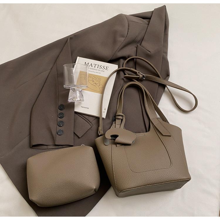 Премиальная портативная сумка-ведро в иностранном стиле женская 2025 новая модная универсальная сумка через плечо простая дорожная сумка-мессенджер