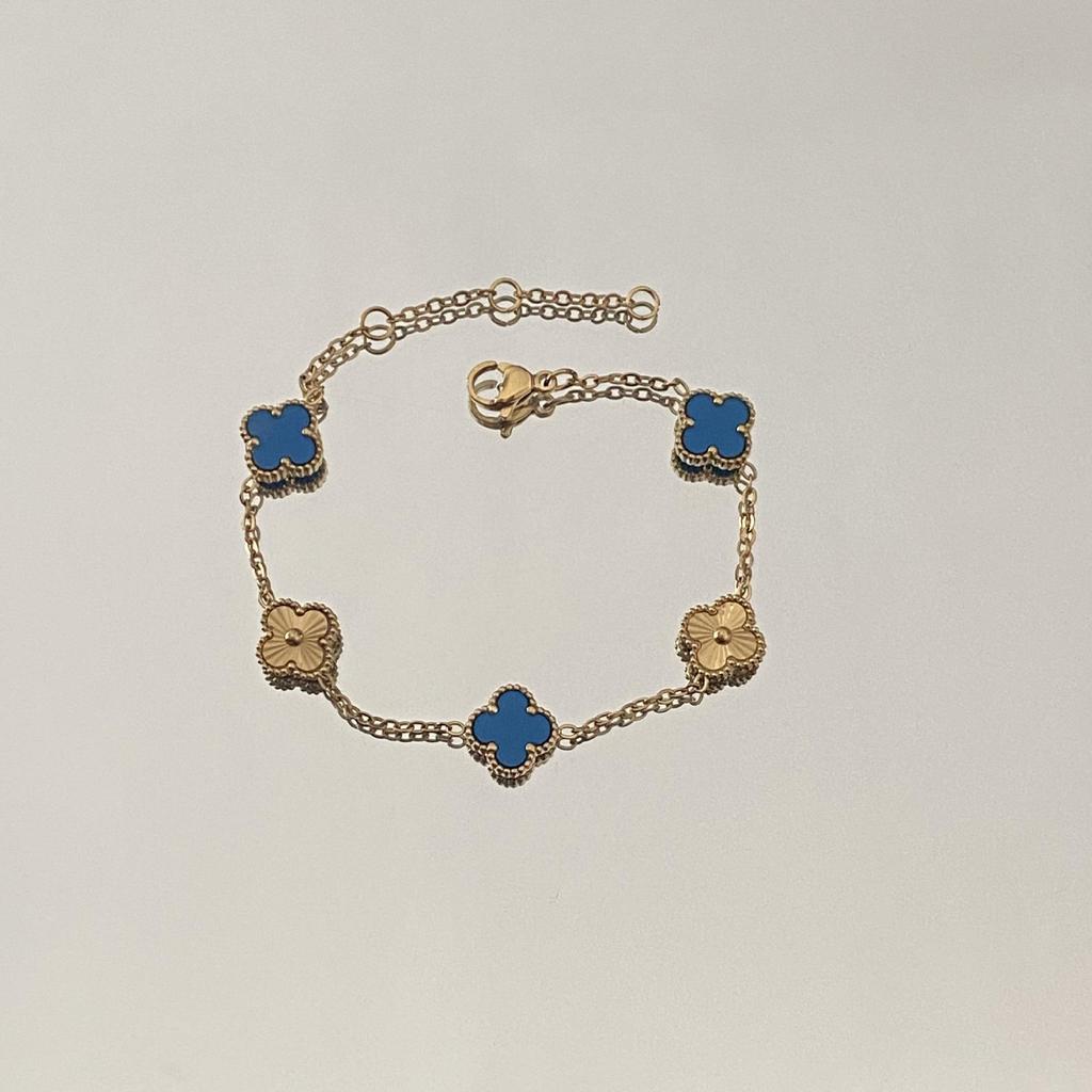 Женский универсальный браслет из титановой стали с четырехлистным клевером - Моющийся, Не выцветающий, Роскошный аксессуар для рук в европейском и американском тренде