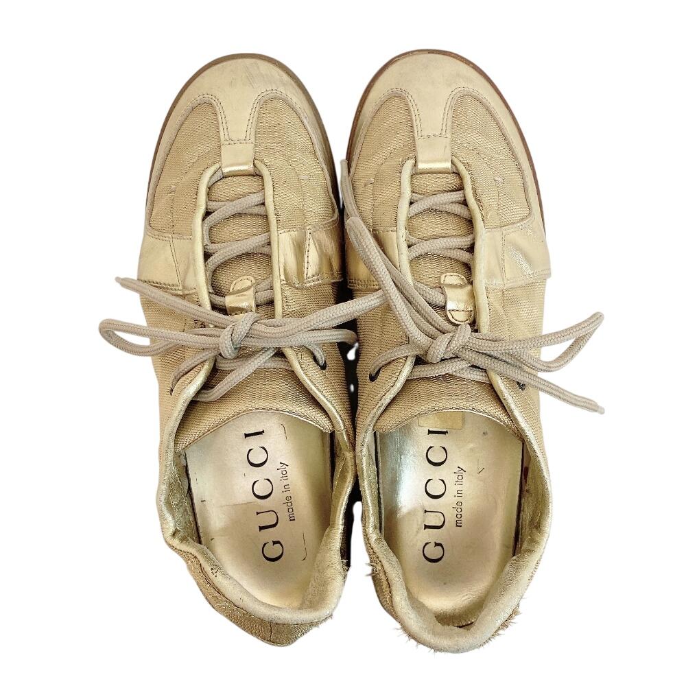 Gucci Низкие кожаные кроссовки золотая кожа Б/у
