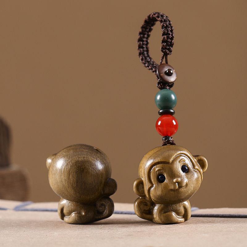 Twelve Zodiac Animal Charms Green Sandalwood Set: Rat, Ox, Tiger, Rabbit, Dragon, Snake, Horse, Sheep, Monkey, Rooster, Dog, Pig.