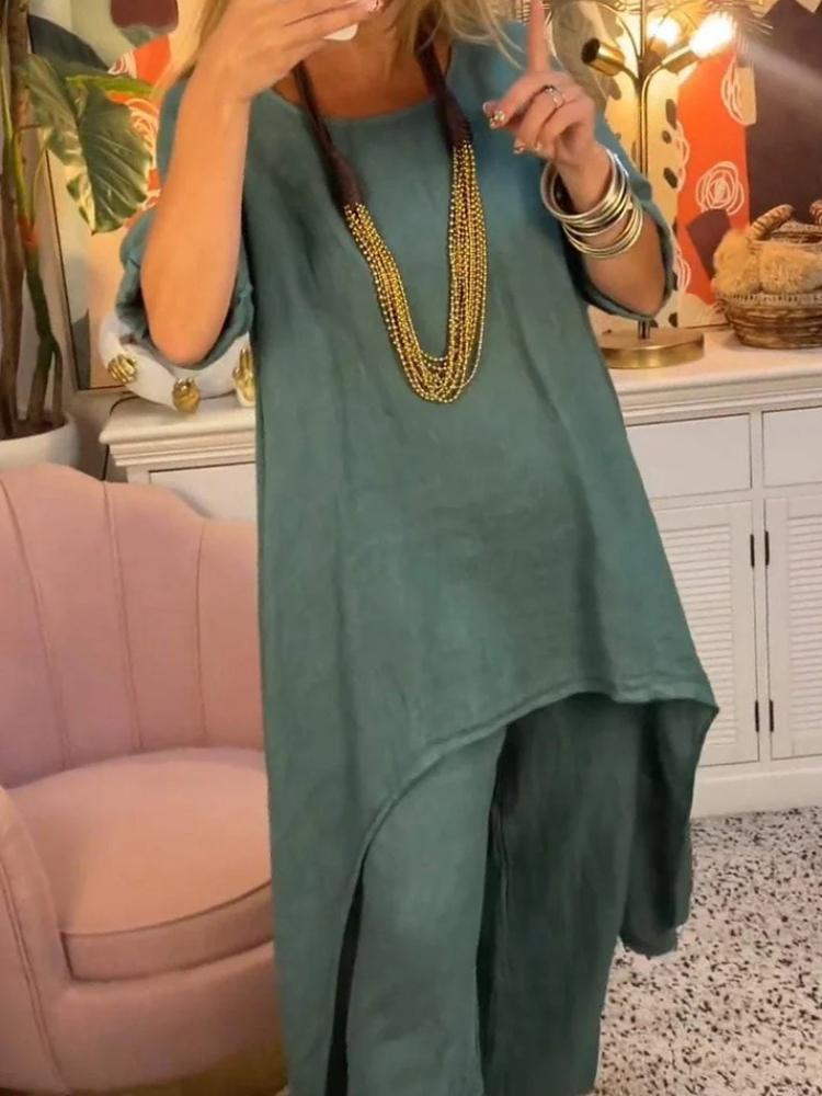 Женский комплект из свободной блузки с асимметричным подолом и брюк широкого кроя в нескольких цветах