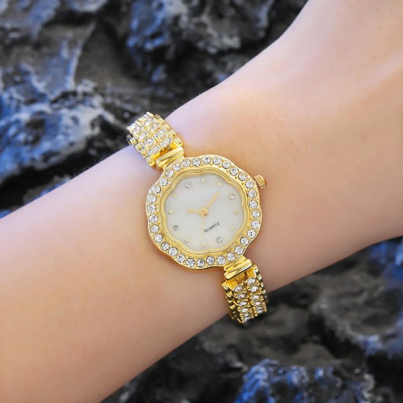 Womens Jewelry Style Metal Watch With Quartz Core And Flower Dial Design