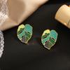 Customized Professional Design, Stainless Steel 18K Electroplating Real Gold Hollow Exaggerated Leaves Green Oil Stud Earrings Female