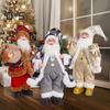 Christmas Santa Doll Decoration 12-Inch Plush Standing Santa Holding Gifts Figure Christmas Party Supplies for Home Desk Bookshelf Windowsill Decor
