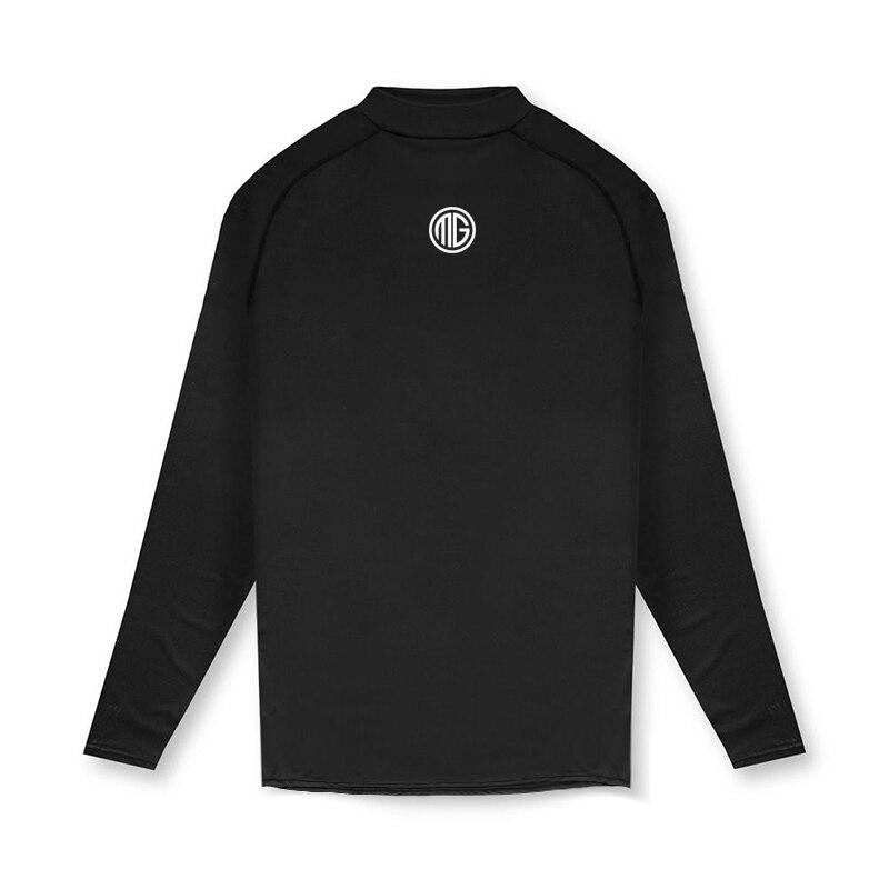 Muscleguys Новые поступления Спортивные футболки с длинными рукавами и высоким воротом Тонкие осенние футболки Slim Fit Мужская одежда для фитнеса