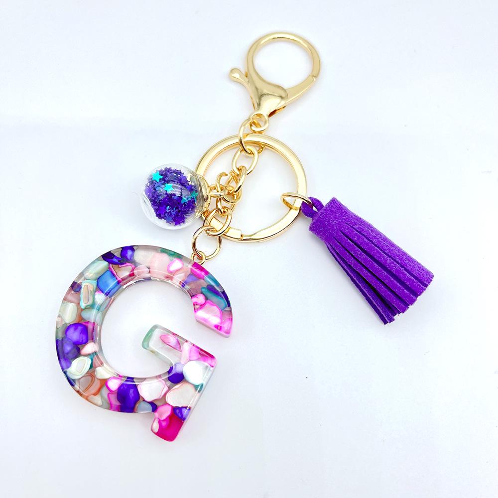 Европейский и американский хит продаж брелок с английскими инициалами и фиолетовой кисточкой