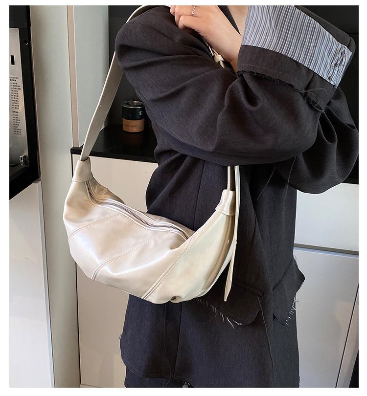 Сумка большой вместимости женская универсальная 2025 новая высококлассный нишевый дизайн широкополосная сумка-мессенджер повседневная сумка-пельмень