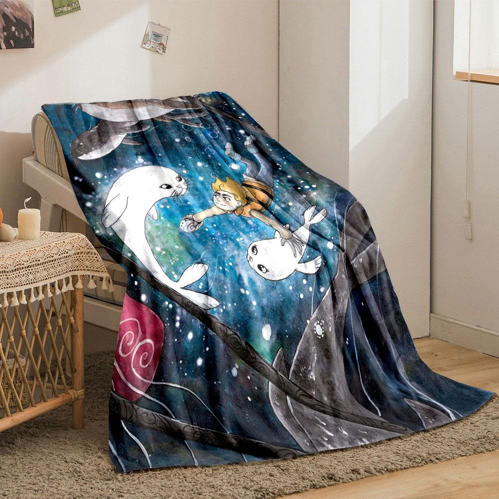 A boy swims underwater with seals amid bubbles and a colorful backdrop. for all seasons blanket lunch break throw gift