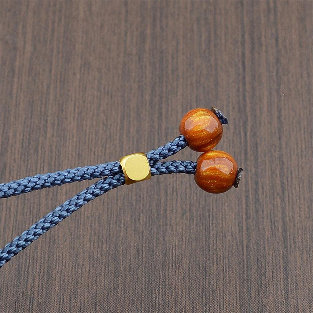 Плетеное макраме ожерелье с кристаллом авантюрина и подвеской из тыквенного нефрита