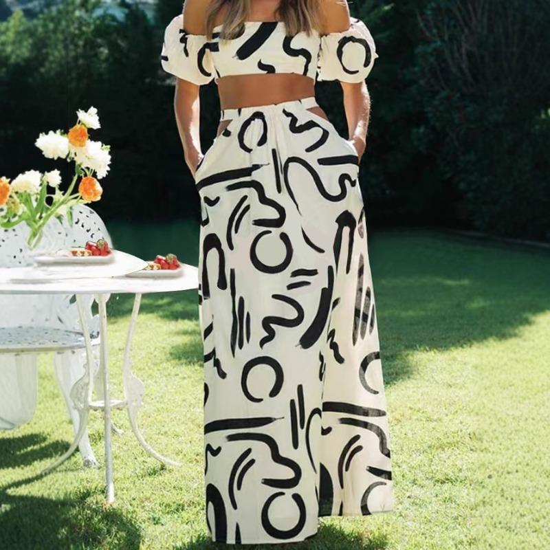 Женский летний костюм с пышными рукавами и длинной юбкой