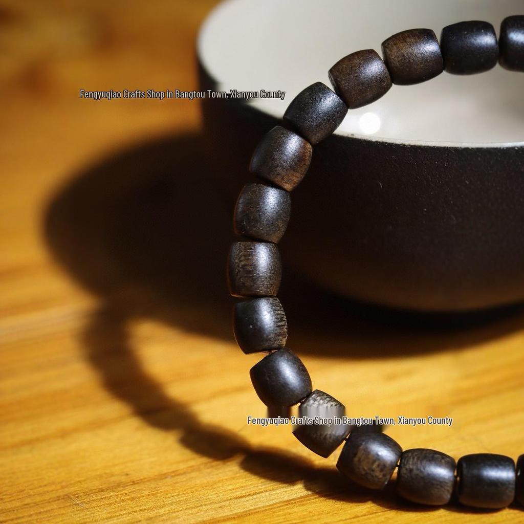 Agarwood Black Qinan High Oil Sinking Bracelet: 108 Bead Buddhist Rosary with Round and Barrel Beads, High-Quality Woody Hand Jewelry.