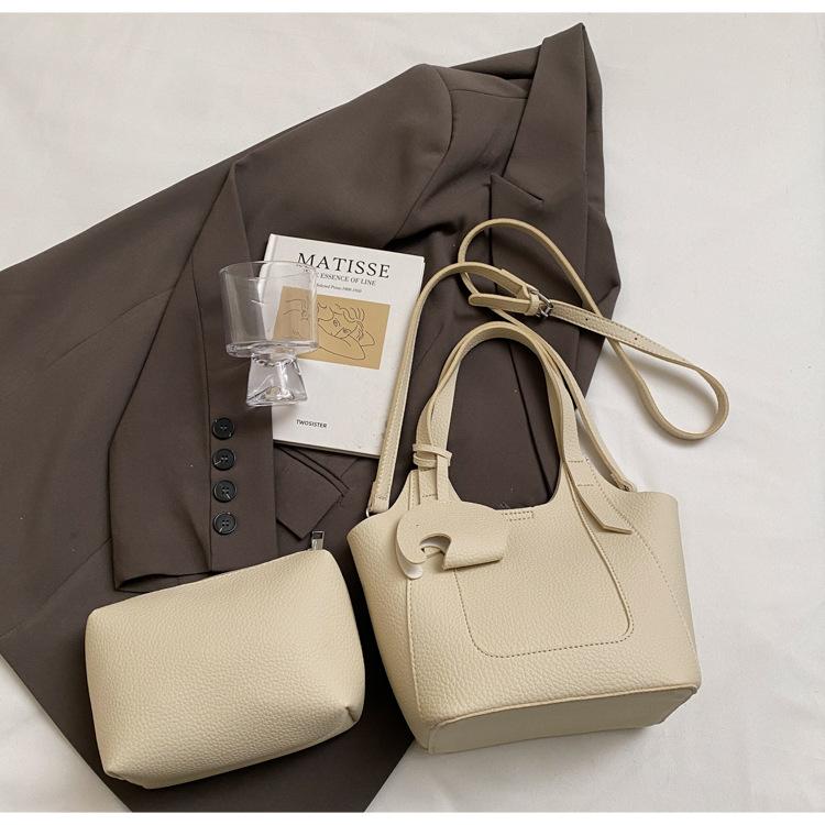 Премиальная портативная сумка-ведро в иностранном стиле женская 2025 новая модная универсальная сумка через плечо простая дорожная сумка-мессенджер