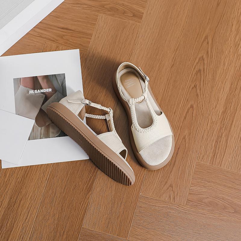 Good-looking French retro woven belt casual flat sandals women's summer new open-toe one-word belt Roman shoes