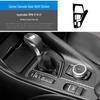 BMW X1/X2 (2012-2021 гг.) Замена наклейки управления салоном из углеродного волокна.