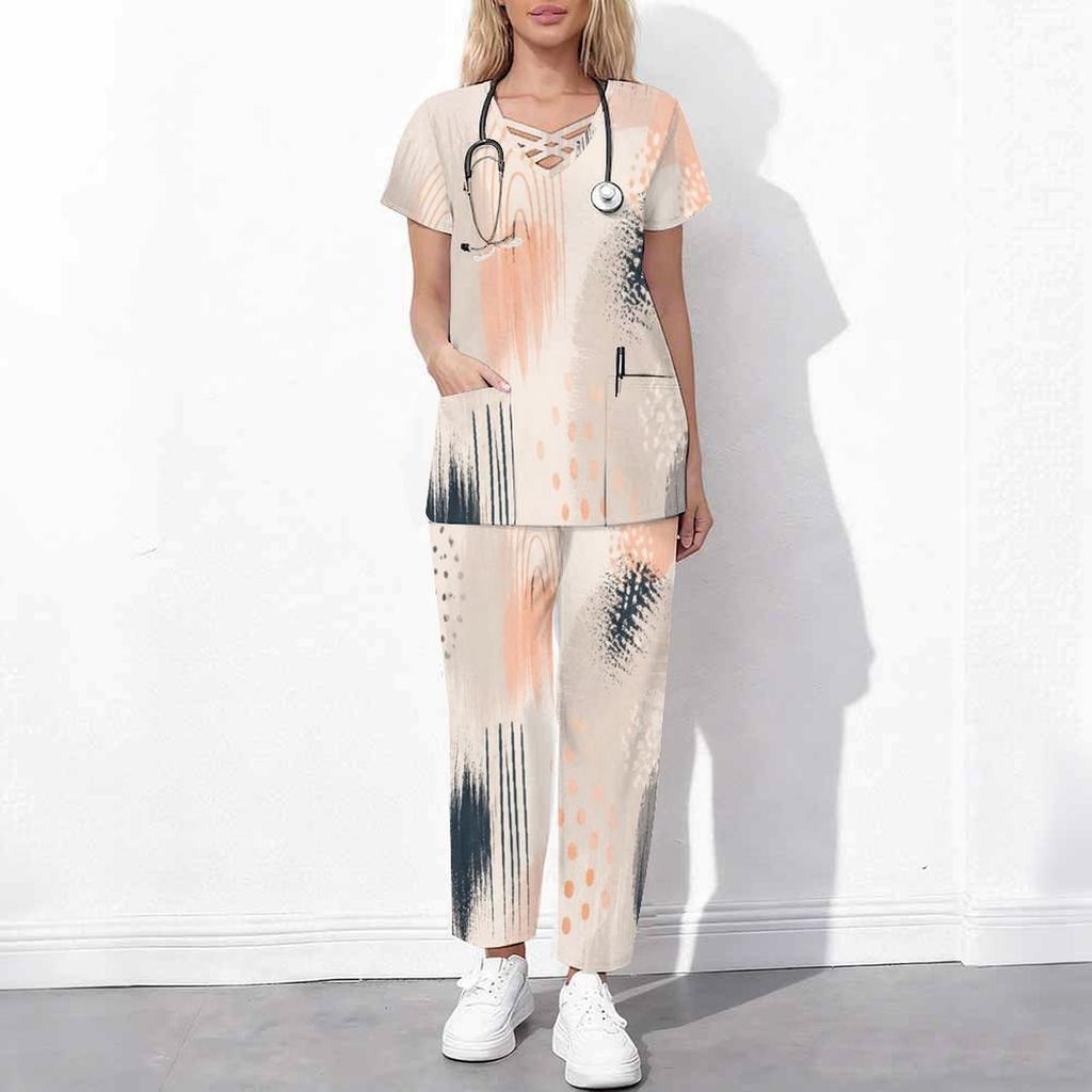 Women Plus Size Printed Scrub Set Crisscross Cutout Neck Short Sleeve Pocket Top Long Pants Two Piece